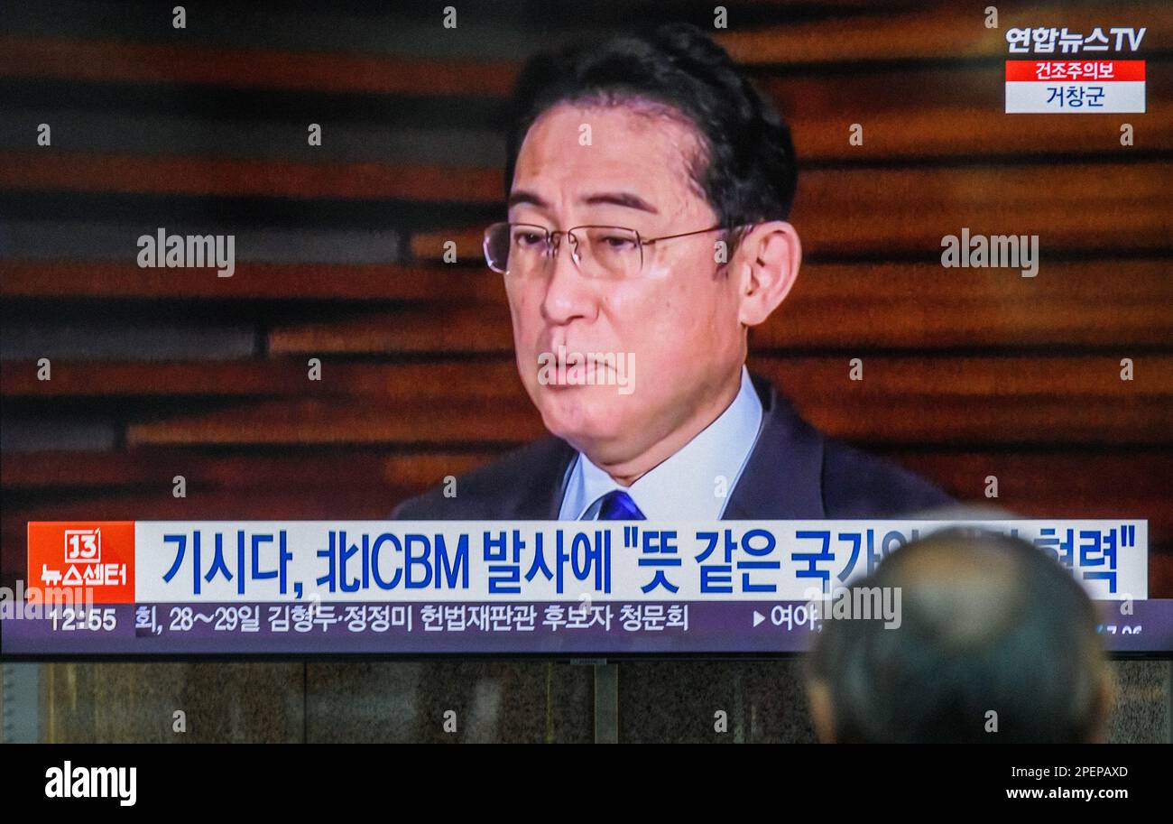 A tv screen shows a file footage of Japanese, Prime Minister, Fumio Kishida during a news program at Yongsanl railway station in Seoul. North Korea fired a long-range ballistic missile toward the East Sea on March 16, Seoul's military said, hours before summit talks between the leaders of South Korea and Japan on pending bilateral issues and regional security.The Joint Chiefs of Staff (JCS) said it detected the launch from the Sunan area in Pyongyang at 7:10 a.m., and the missile, fired at a lofted angle, flew some 1,000 kilometers before splashing into the sea. Later today, South Korean Pres Stock Photo