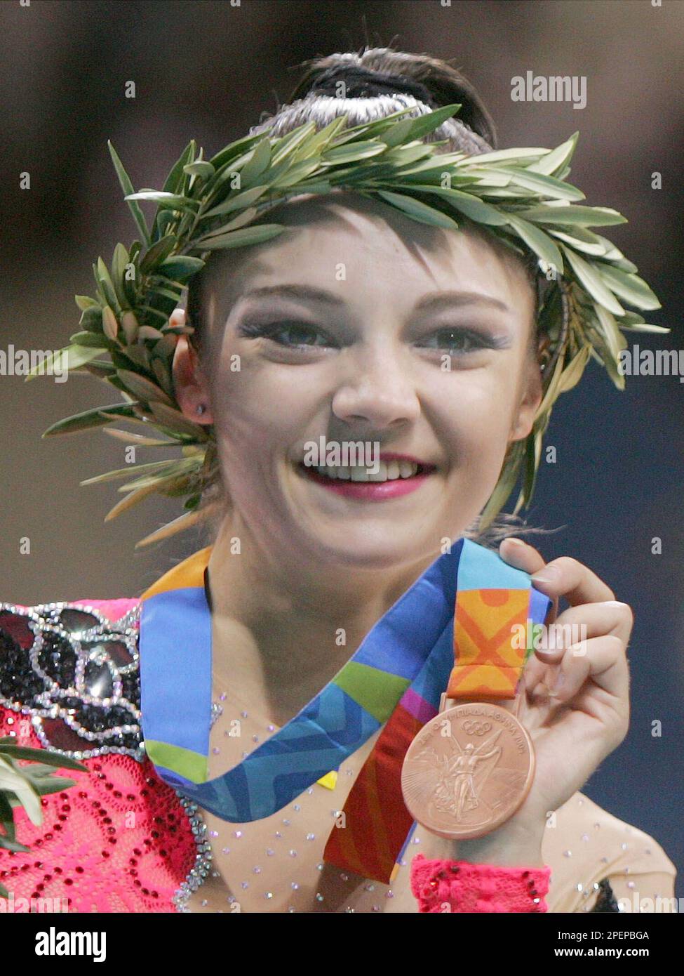 Anna Bessonova of thw Ukraine shows her bronze medal during a medal ...