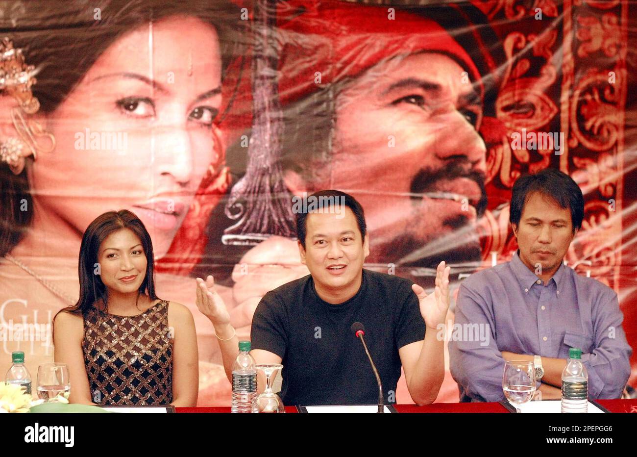 Malaysian director Saw Teong Hin, center, talks about his film