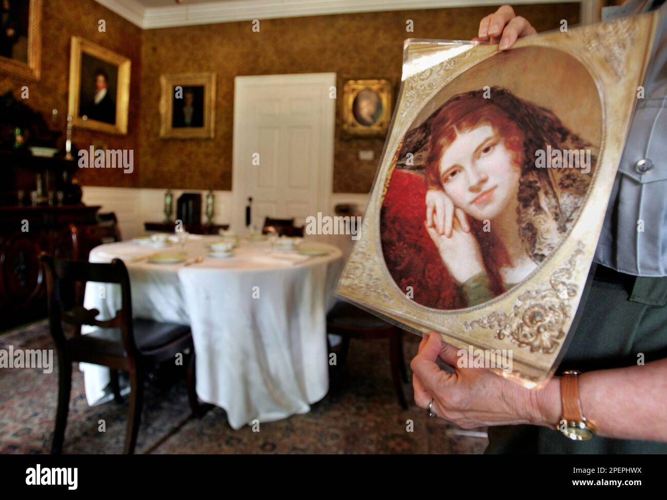 Supervisory Park Ranger Nancy Jones, right, displays a copy of a ...