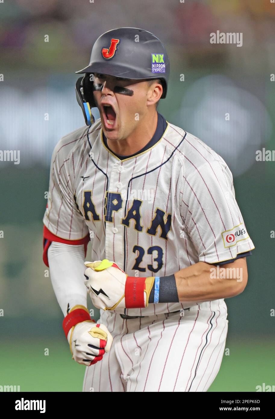 Japan's Lars Nootbaar reacts after hitting a single during the first