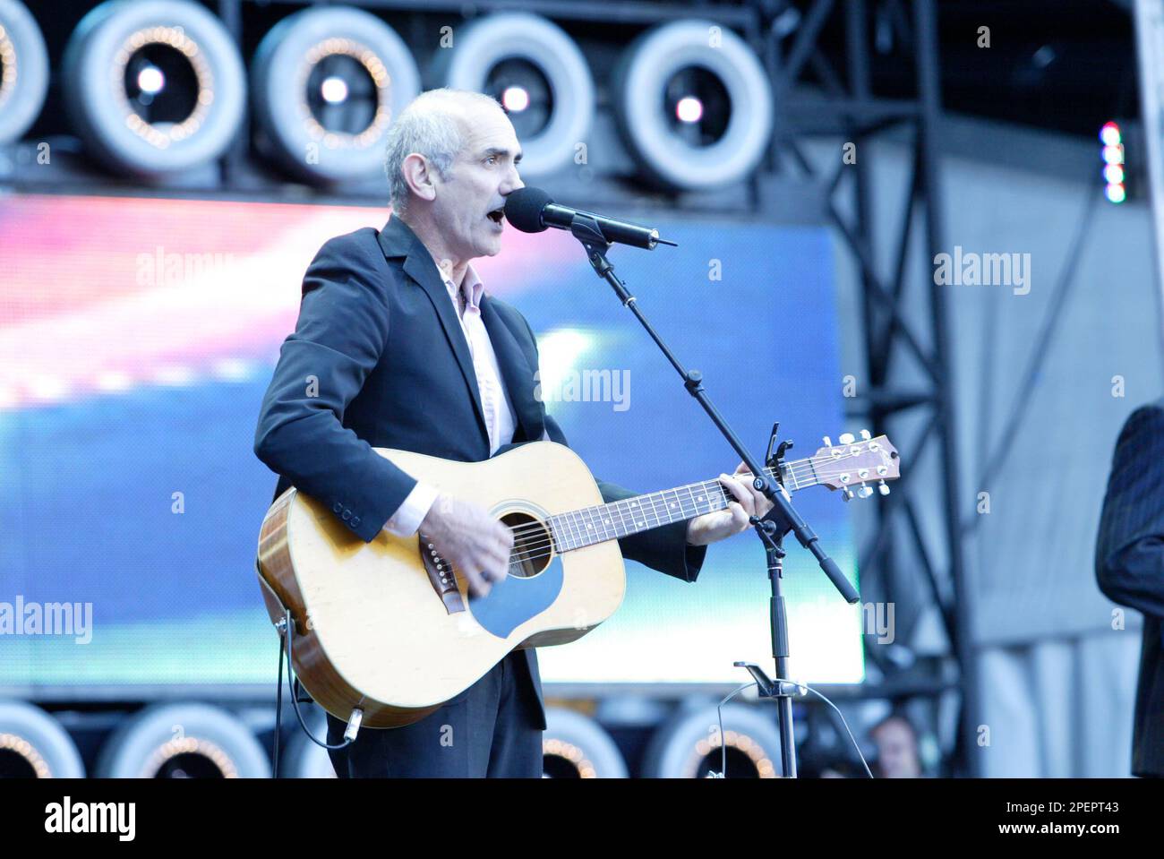 Paul Kelly and band performing at the Live Earth concert. Aussie
