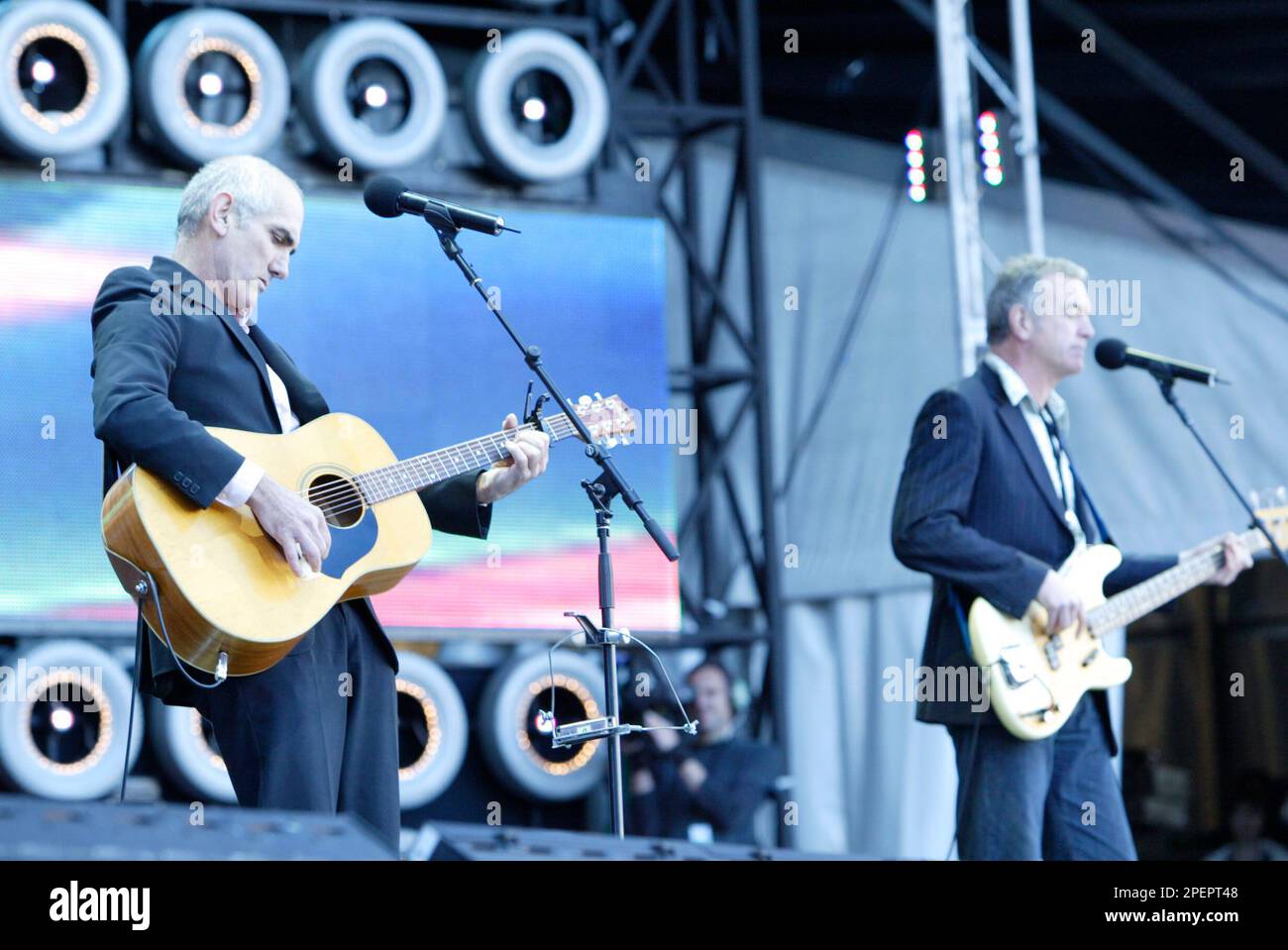 Paul Kelly and band performing at the Live Earth concert. Aussie