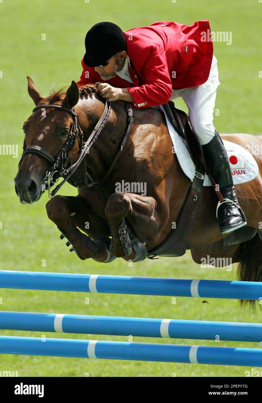 Japan's Ryuichi Obata rides Oliver Q during the first Japan's Ryuichi Obata rides Oliver Q during the first