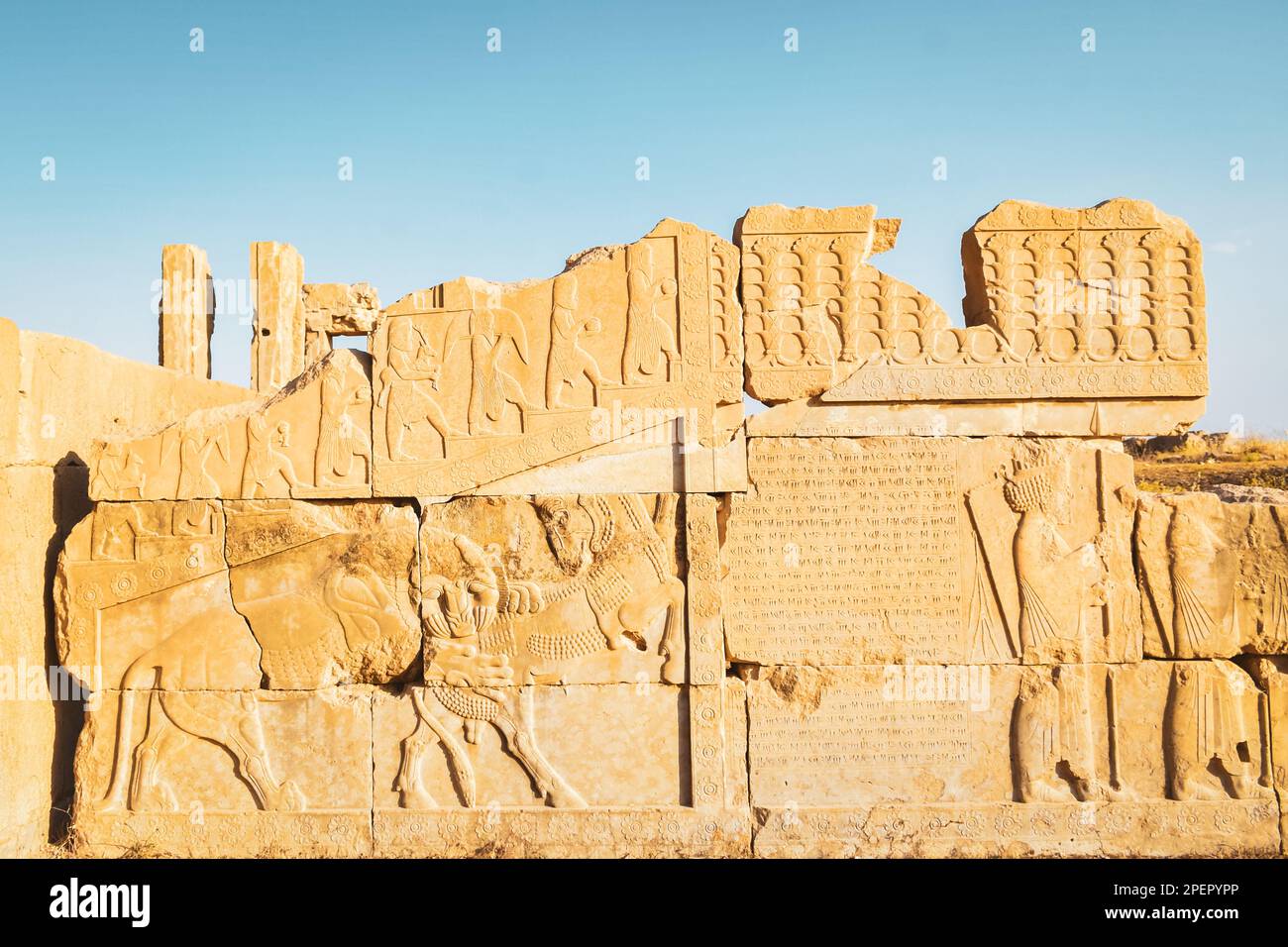 Persepolis, Iran - 8th june, 2022: The ancient tombs of Achaemenid dynasty Kings of Persia are carved in rocky cliff in Naqsh-e Rustam, Iran Stock Photo
