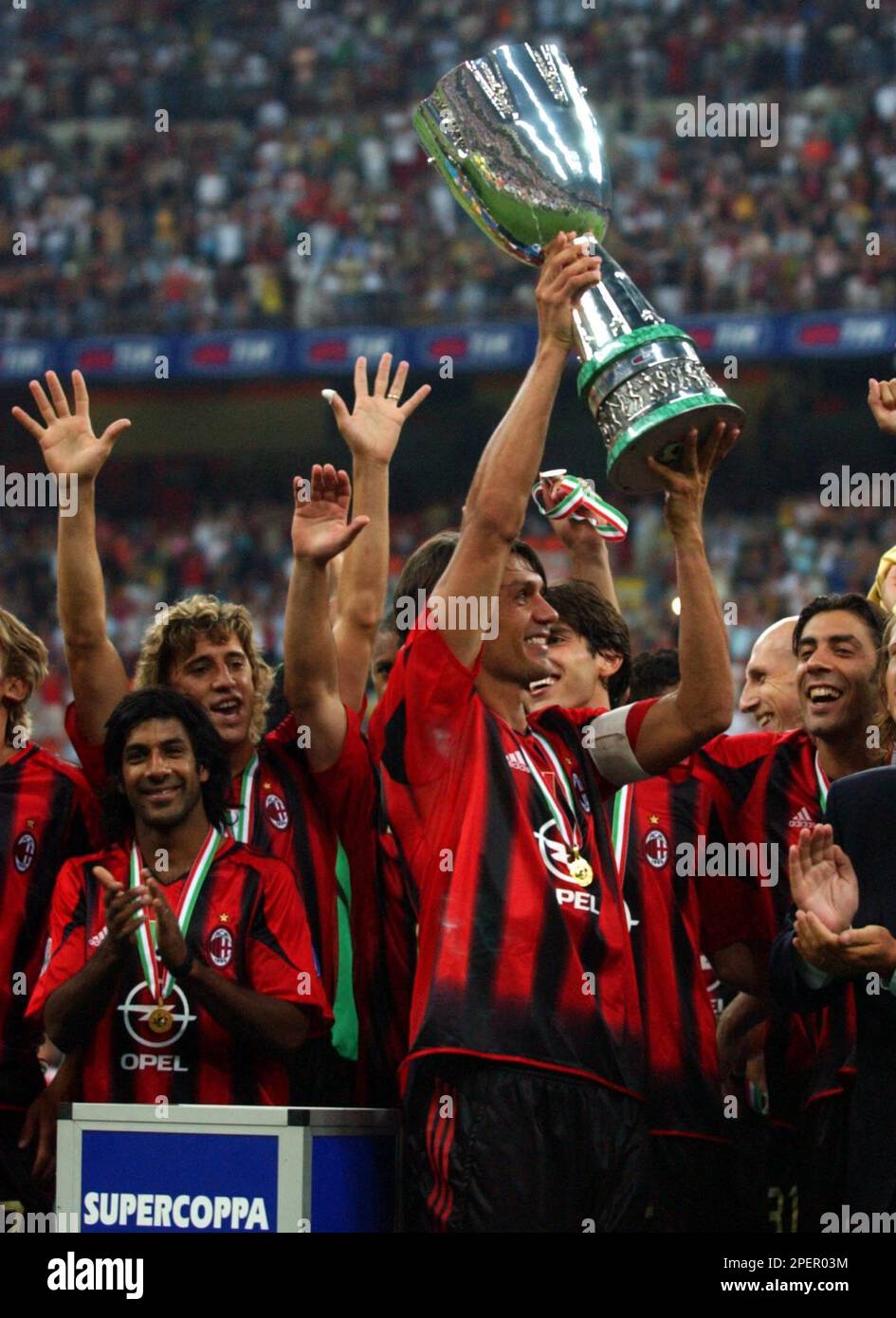 AC Milan Paolo Maldini holds the trophy after winning the Italy