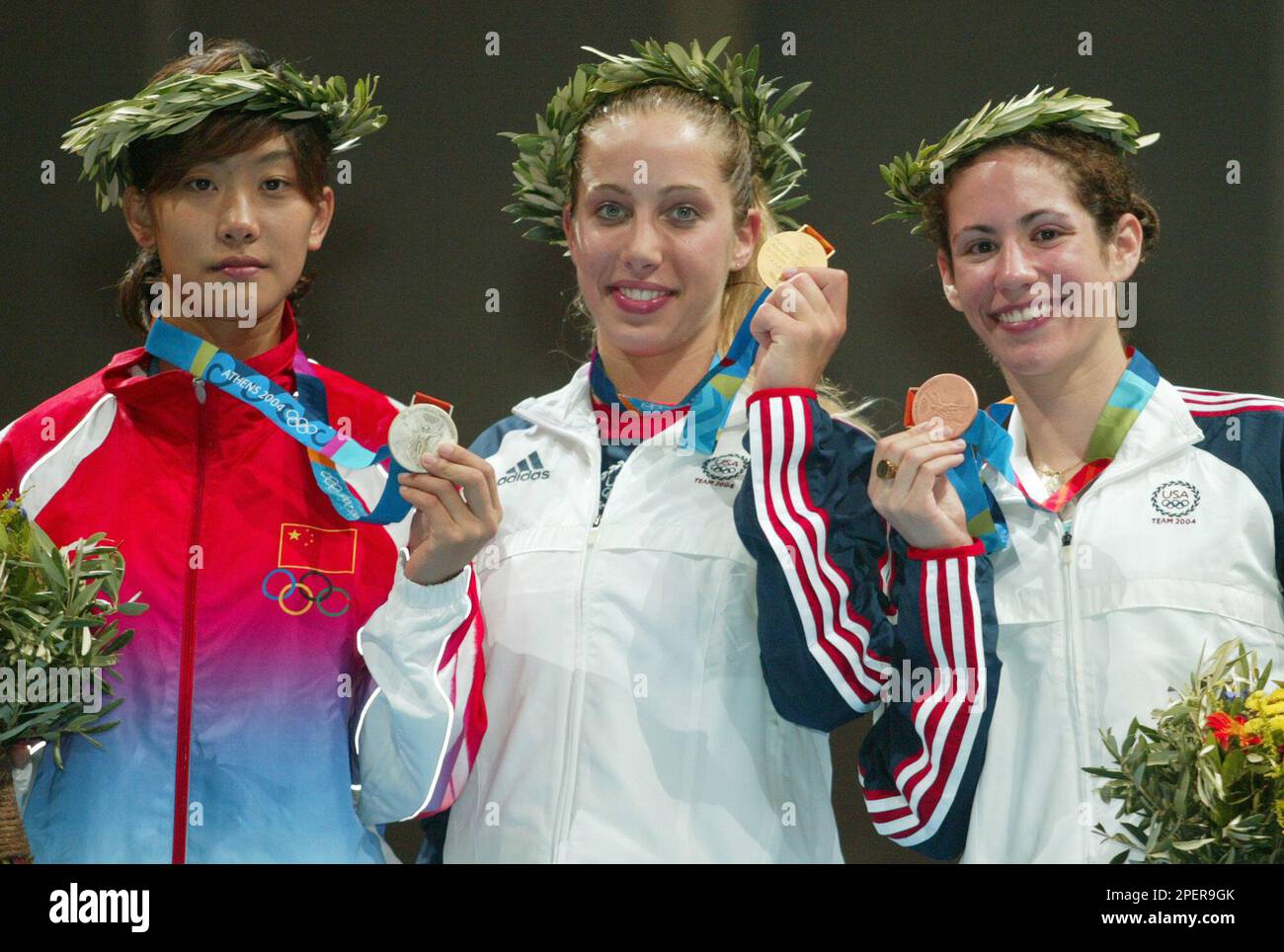 USA's gold medalist Mariel Zagunis, center, China's silver medalist Tan