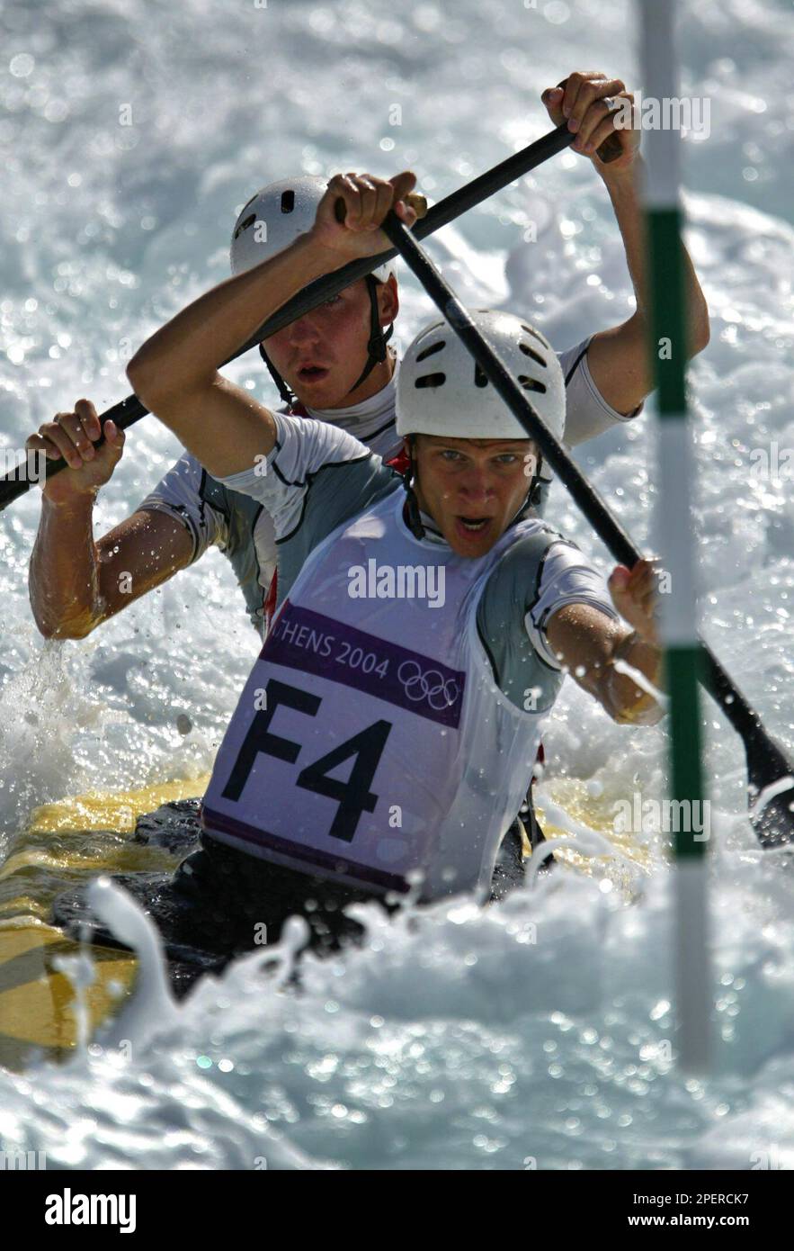 An unidentified pair for the C2 canoe double category tests the race course during a demonstration day at the Olympic Canoe-Kayak slalom venue of the Helliniko Sports Complex at the 2004 Olympic