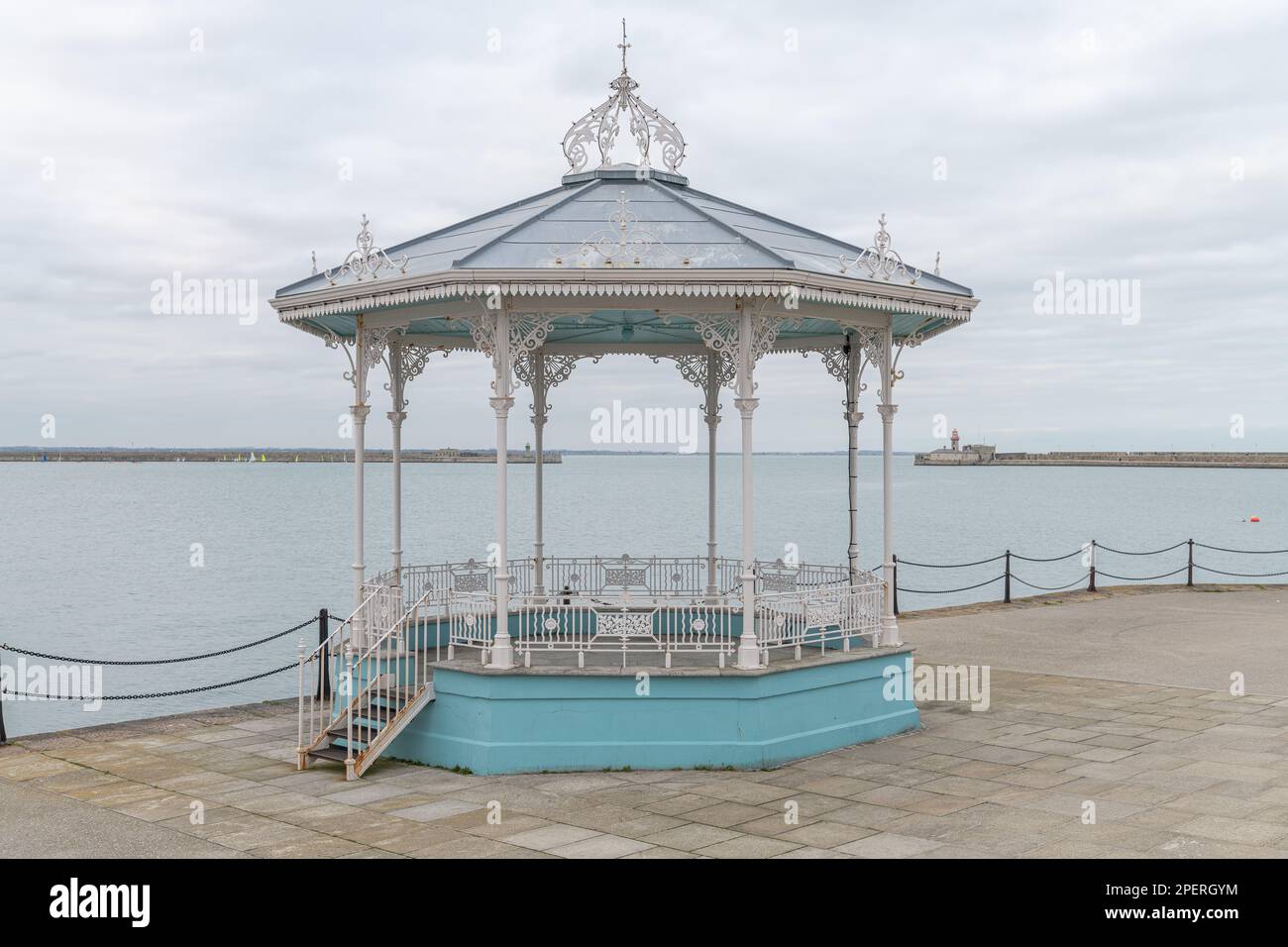 The restored East Pier Bandstand with the harbour behind, Dun Laoghaire, Ireland Stock Photo
