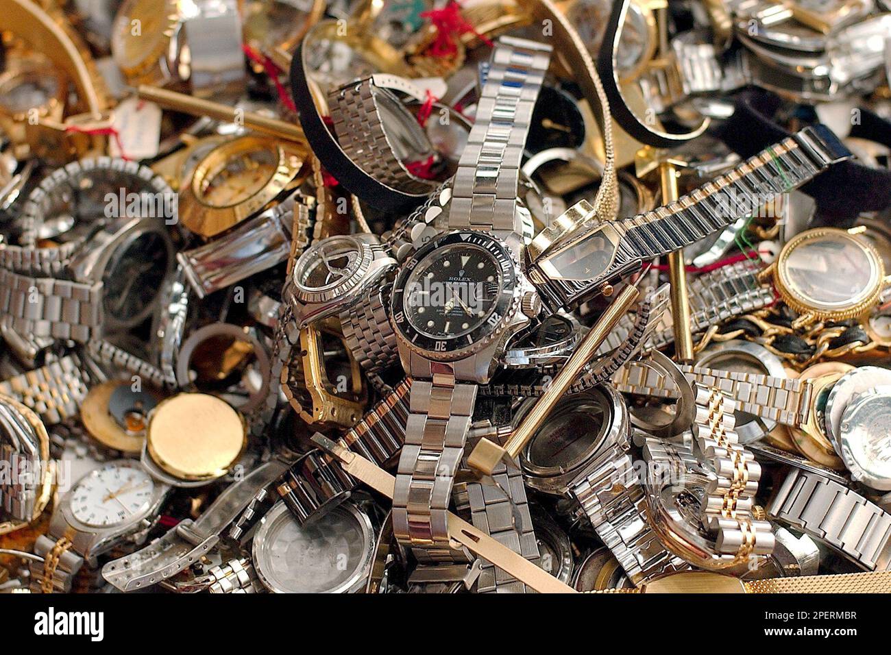 Confiscated counterfeit Swiss watches are shown in Cressier