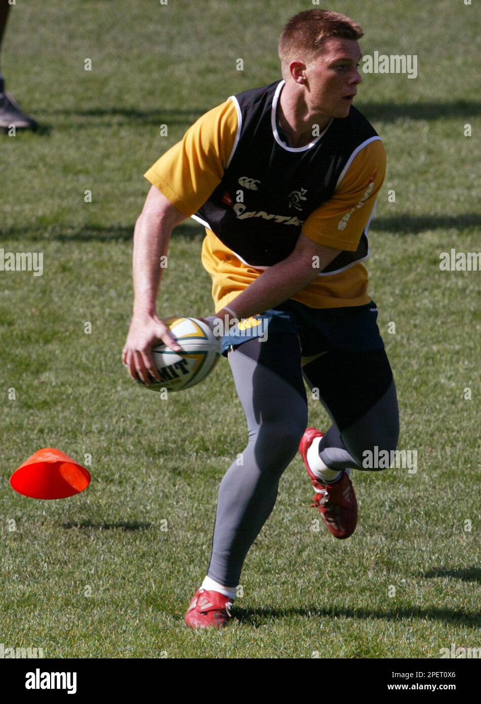Clyde Rathbone Rugby Australian rugby union winger Clyde Rathbone looks to pass the ball ...
