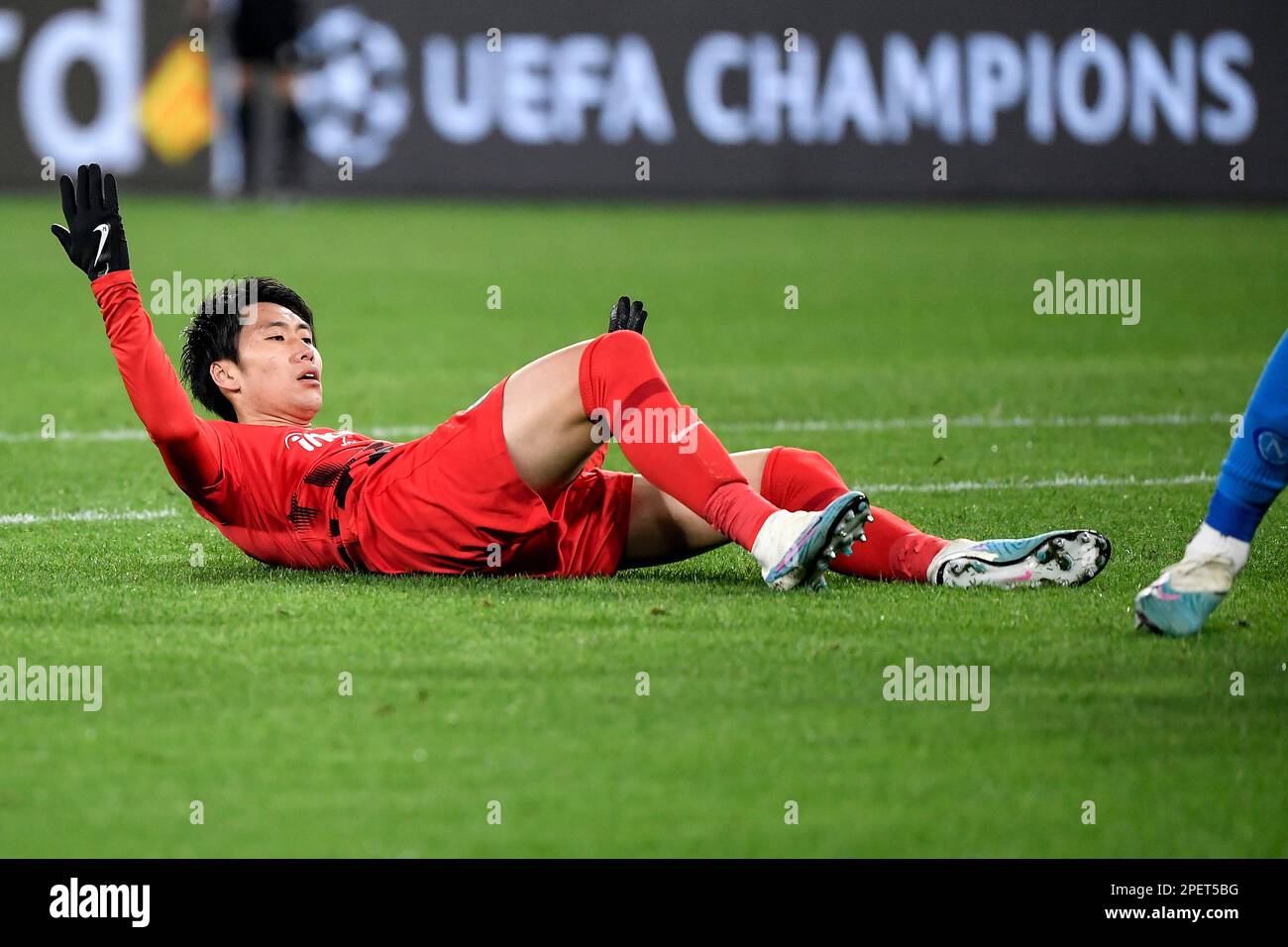 Daichi Kamada of Eintracht Frankfurt on the ground looks dejected during the Champions League football match between SSC Napoli and Eintracht Frankfur Stock Photo