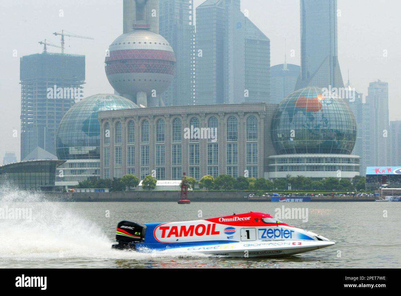 Guido Cappellini of Italy drives his Tamoil motor boat on the Huangpujiang  river for the qualifying session of the F1 Powerboat Grand Prix of China in  Shanghai, China, Saturday, July 31, 2004.
