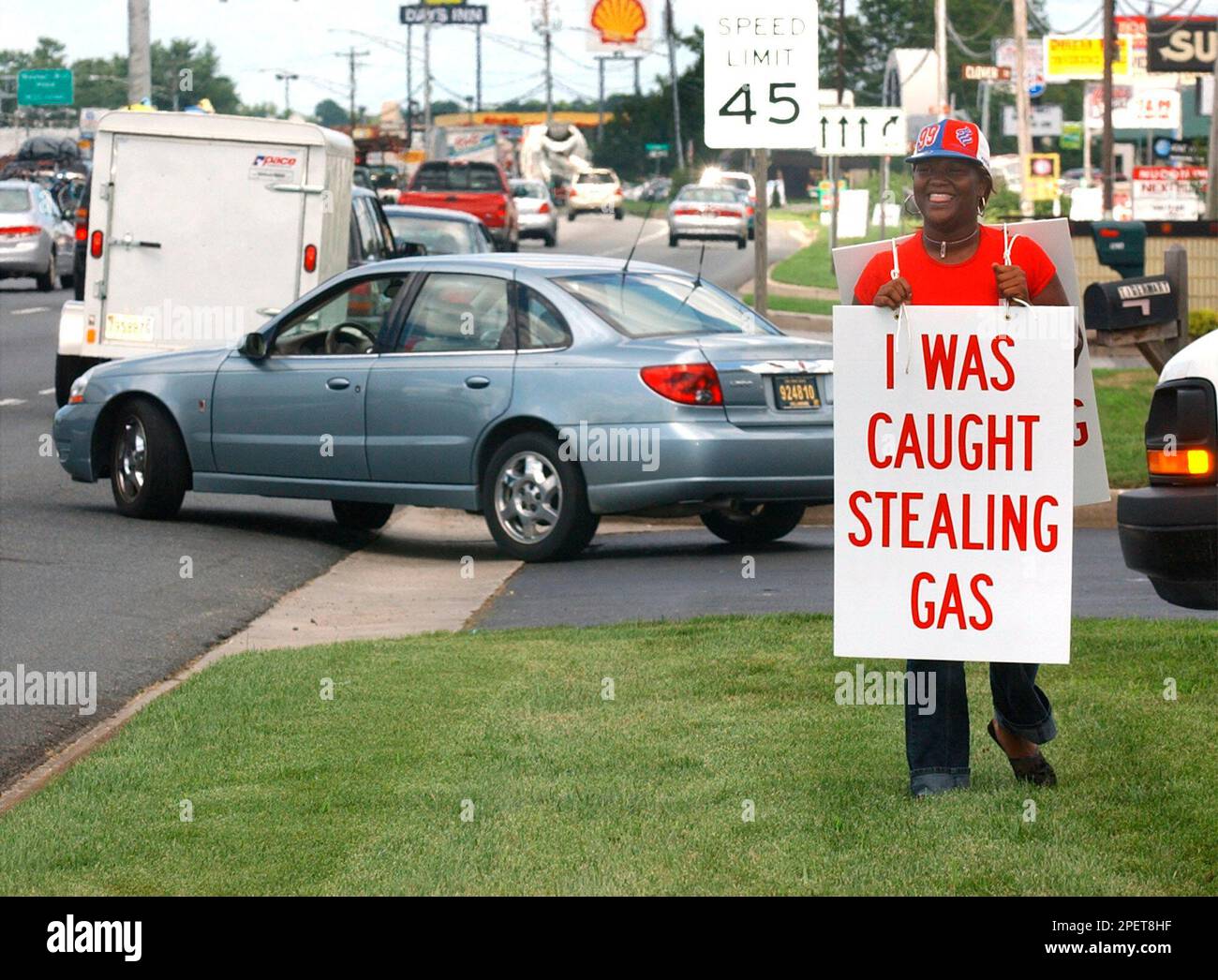 https://c8.alamy.com/comp/2PET8HF/sherelle-purnell-18-of-salisbury-md-walks-along-route-13-wearing-a-sign-reading-i-was-caught-stealing-gas-in-front-of-the-tiger-mart-gas-station-she-stole-from-friday-july-30-2004-in-salisbury-md-on-april-4-purnell-pulled-up-to-a-pump-at-the-station-and-filled-her-car-with-278-gallons-of-fuel-according-to-court-records-purnell-drove-away-without-paying-for-the-gas-though-wicomico-county-district-court-judge-d-william-simpson-authorized-the-punishment-the-unconventional-sentencewas-the-brainchild-of-tiger-mart-store-manager-jan-phipps-according-to-the-alexandria-va-bas-2PET8HF.jpg