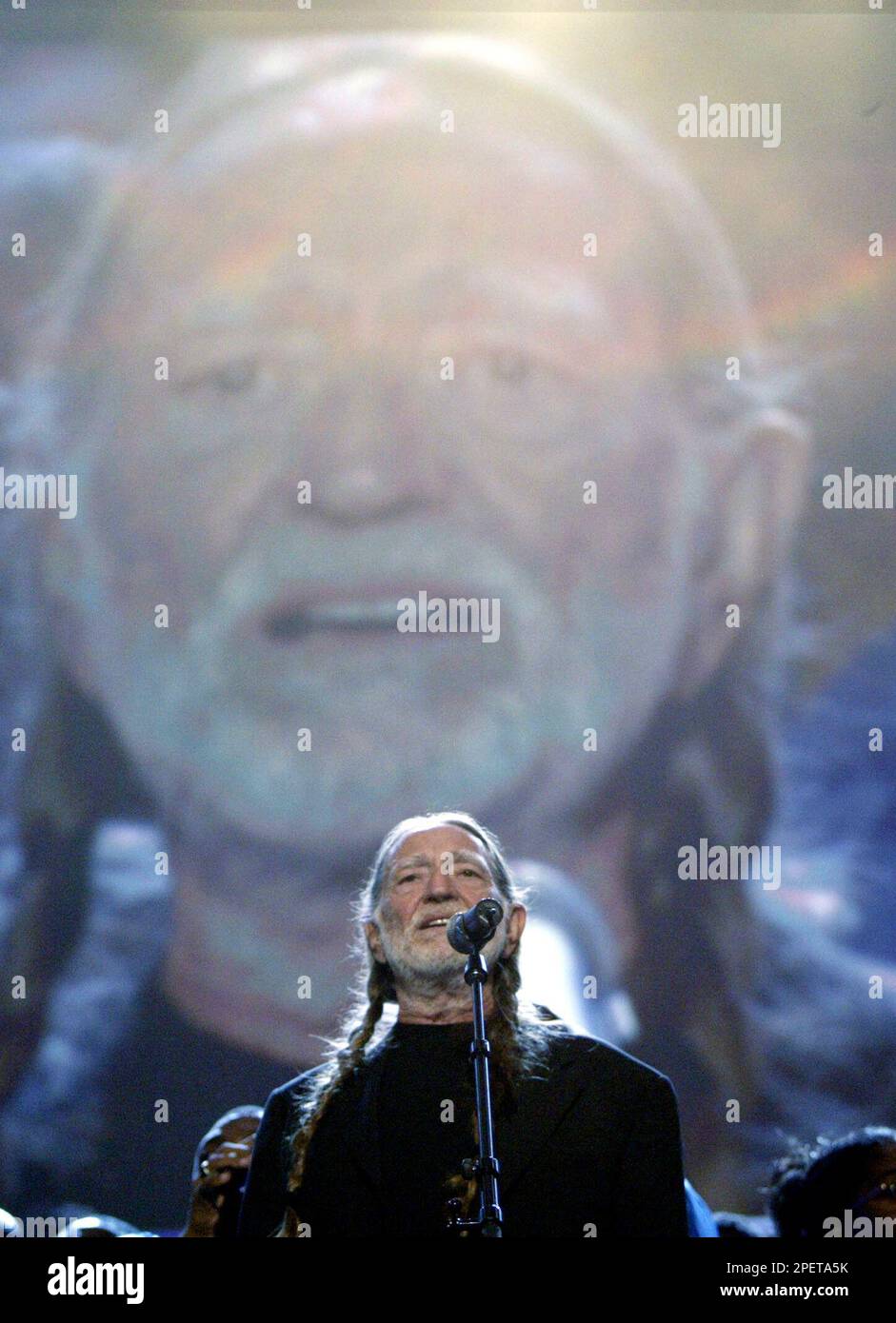 Willie Nelson sings " Living in a Promised Land" Thursday, July 29