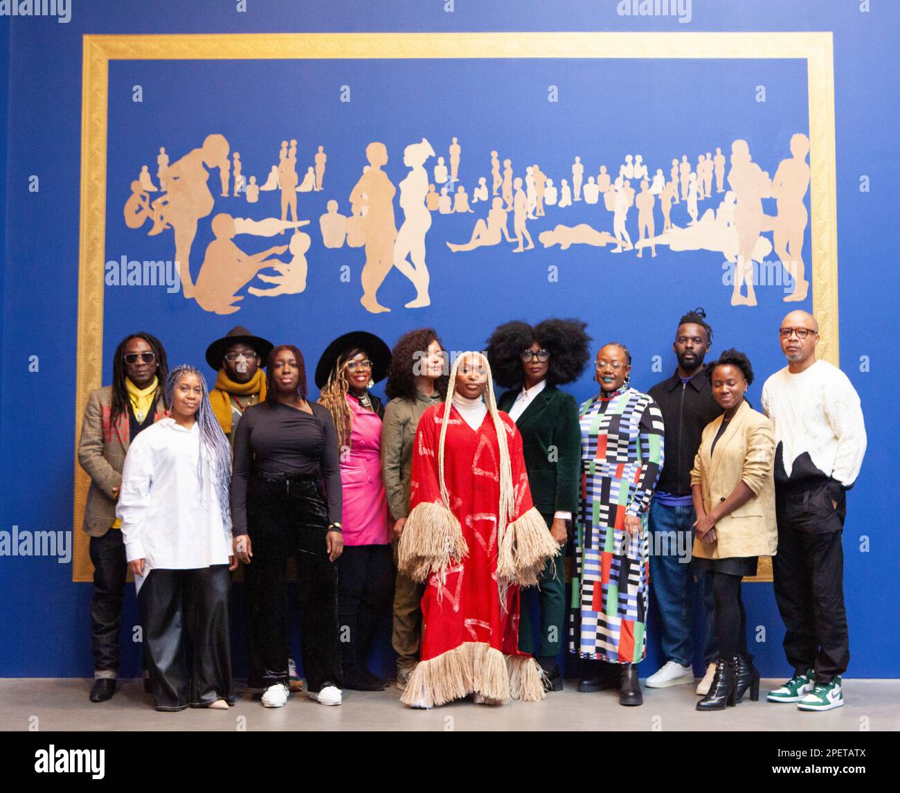 London, UK. 16th Mar, 2023. Artists at their group exhibition, Rites of Passage, curated by Peju Oshin exploring issues of migration, identity and belonging. L-R: Femi Dawkins, Ayesha Feisal, Àsìkò, Emily Moore Adelaide Damoah, Phoebe Boswell, curator Péjú Oshin, Elsa James, Sharon Walters, Tunji Adeniyi-Jones, Enam Gbewonyo, Victor Ehikhamenor . Credit: Anna Watson/Alamy Live News Stock Photo