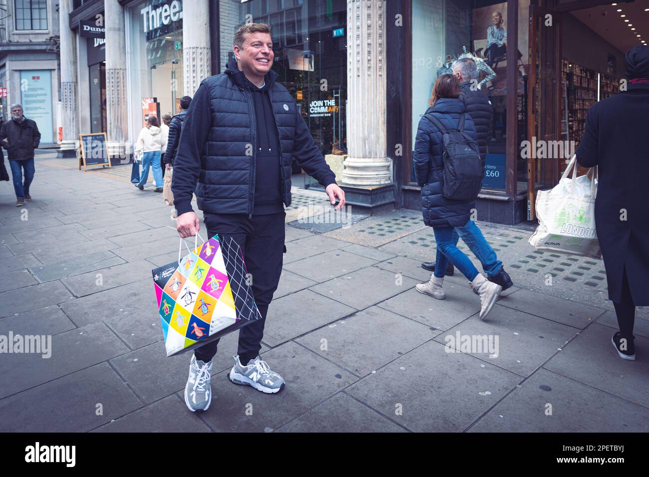 Thomas Henry Skinner, the English businessman and television personality, walks on Oxford street on a cloudy winter day in London in 2023 Stock Photo