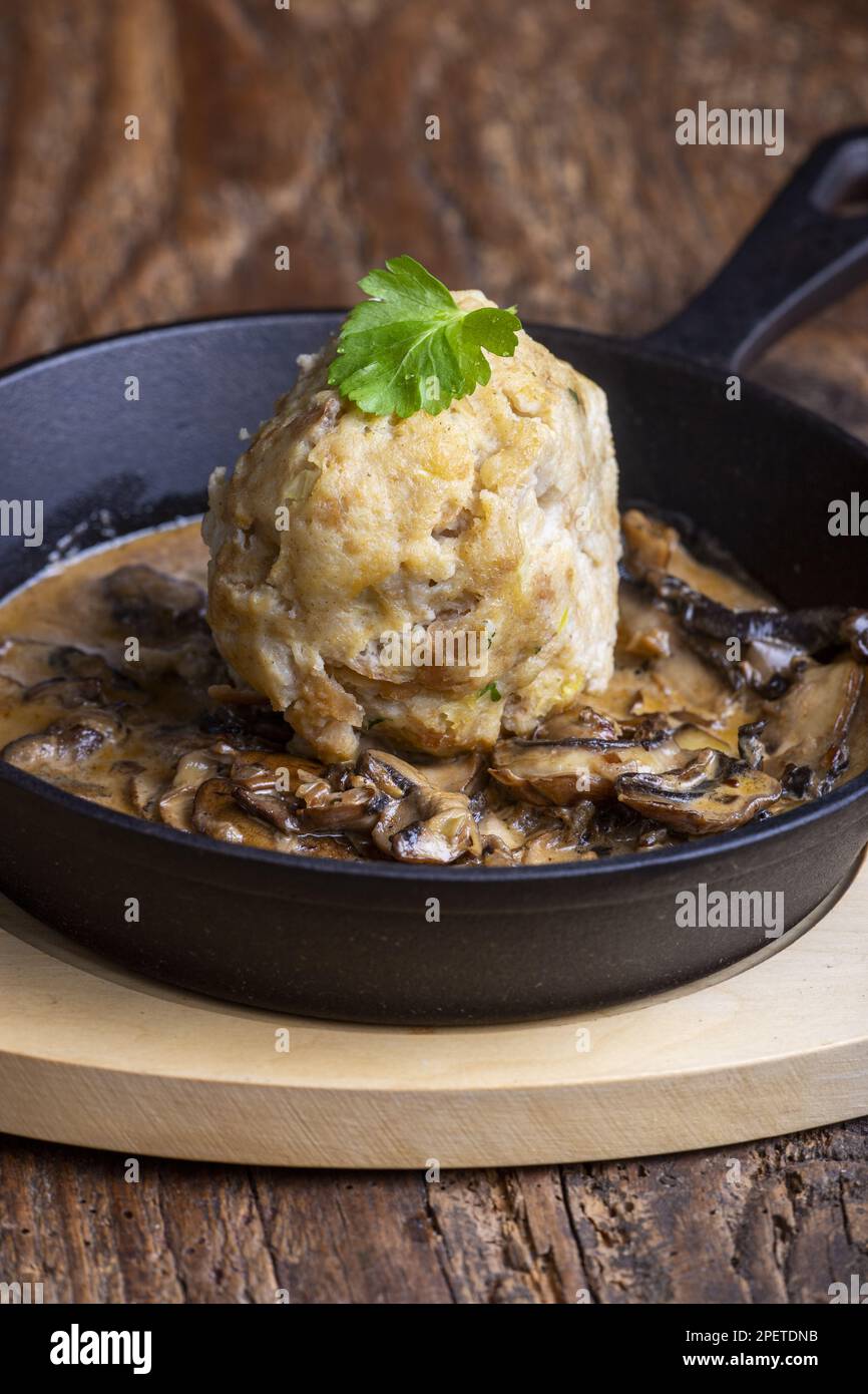 Bavarian Bread Dumpling In Mushroom Sauce Stock Photo