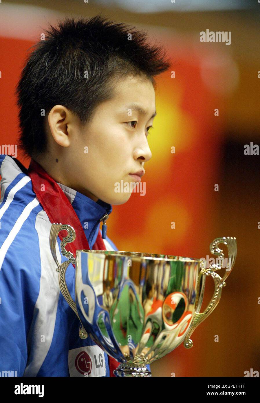 Feng Yalan of China, gold medallist in the girls singles looks on