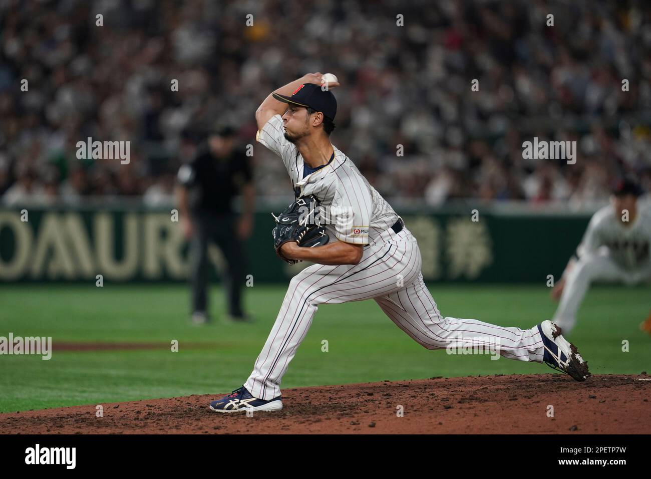 Japan's relief pitcher Yu Darvish throws during the seventh inning of ...