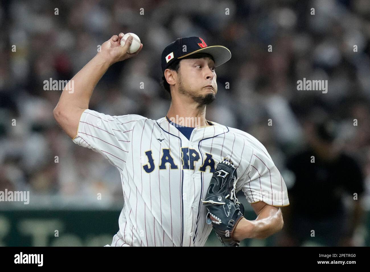 Japan's relief pitcher Yu Darvish throws during the seventh inning of ...