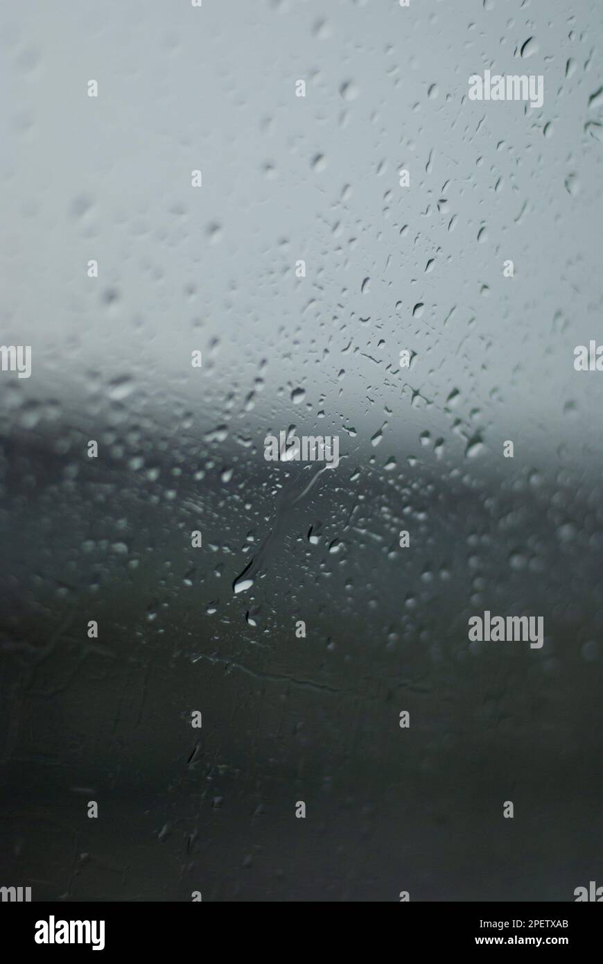 Rain on car window hi-res stock photography and images - Alamy