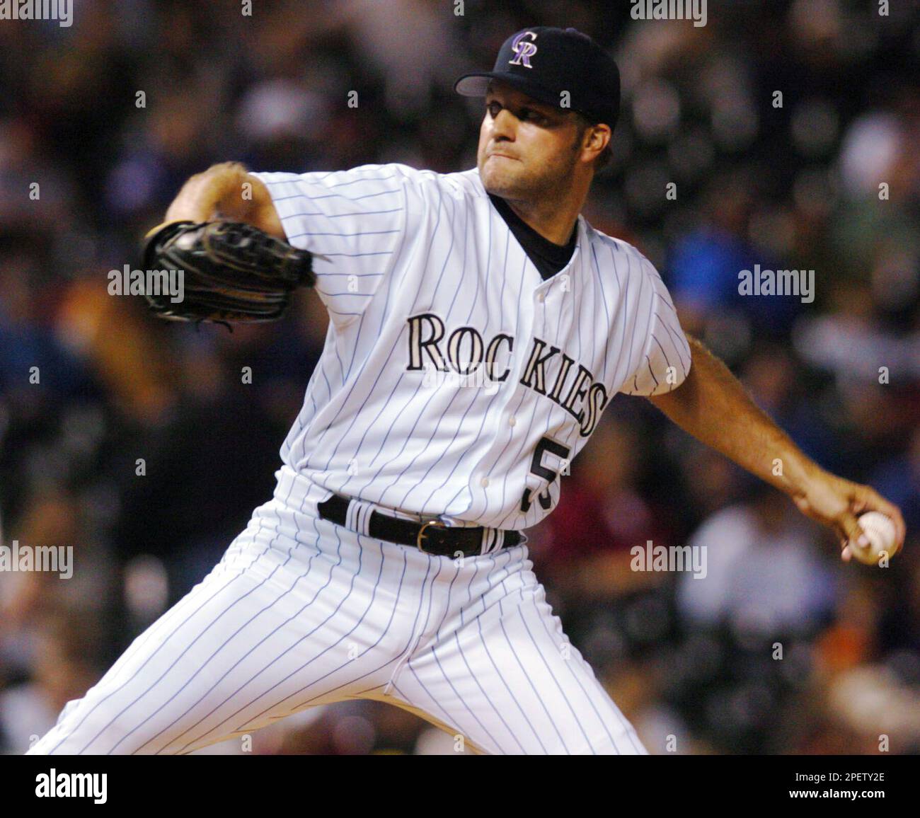 Colorado Rockies starting pitcher Shawn Estes delivers a pitch to San  Francisco Giants batter Marquis Grissom in the fourth inning of a game  delayed by more than two hours by rain in