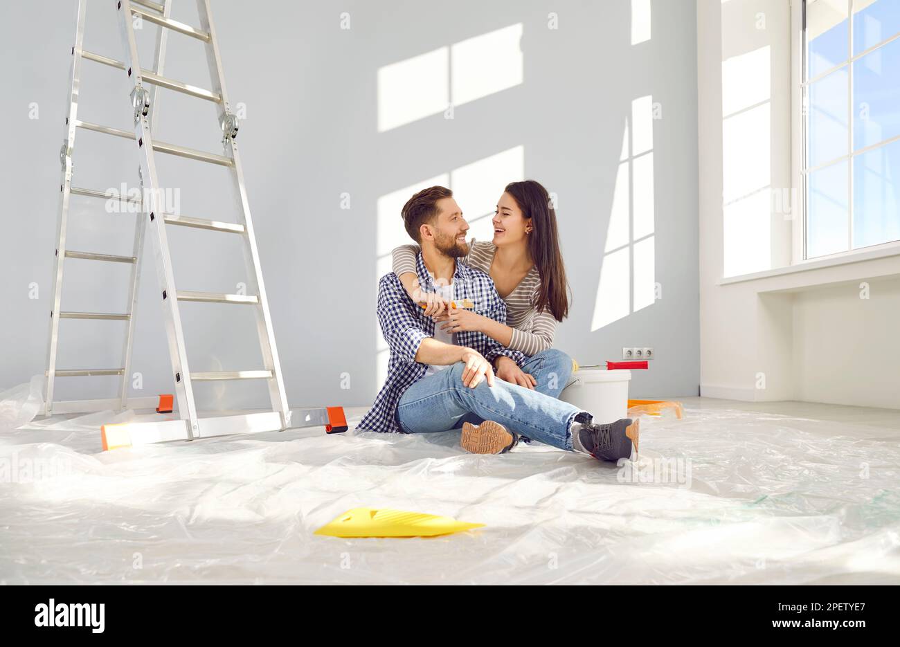 Happy family doing repair home hi-res stock photography and images - Alamy