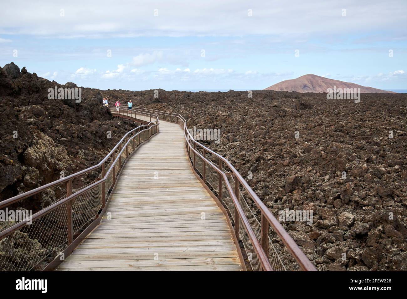 wooden boardwalk walkway above lava fields from visitors centre parque nacional de timanfaya Lanzarote, Canary Islands, Spain Stock Photo