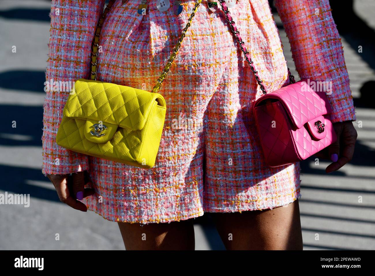 A pink Chanel bag outside Chanel during Paris Fashion Week Haute