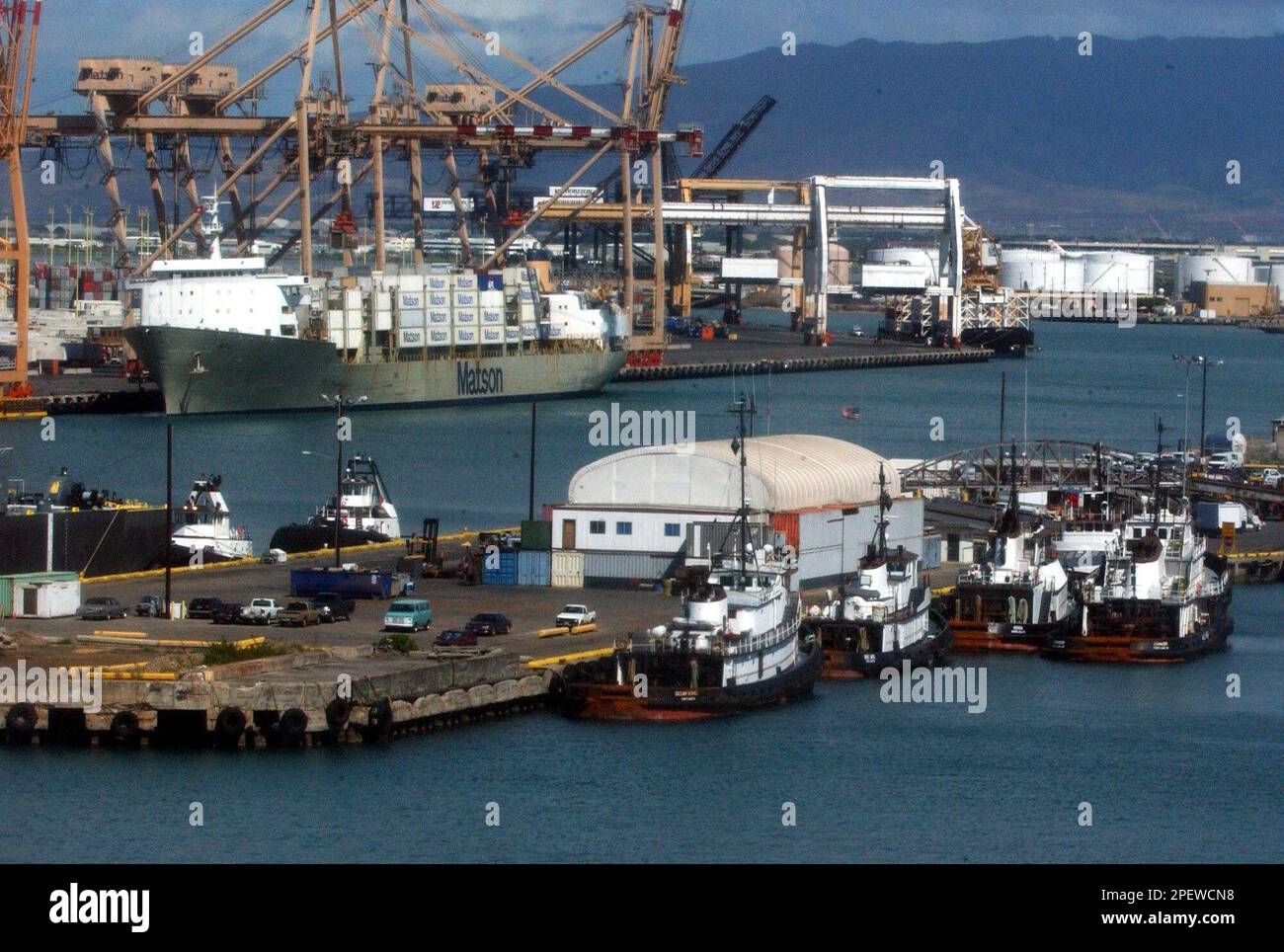 Tugboat docks at the pier in Honolulu Harbor Sunday, July 4, 2004