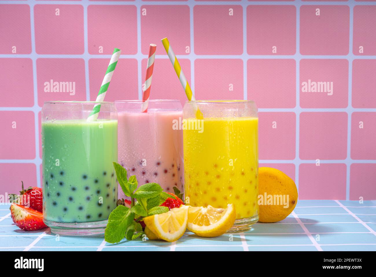 Set of three colorful summer bubble tea, bright creamy pearl tea or ...
