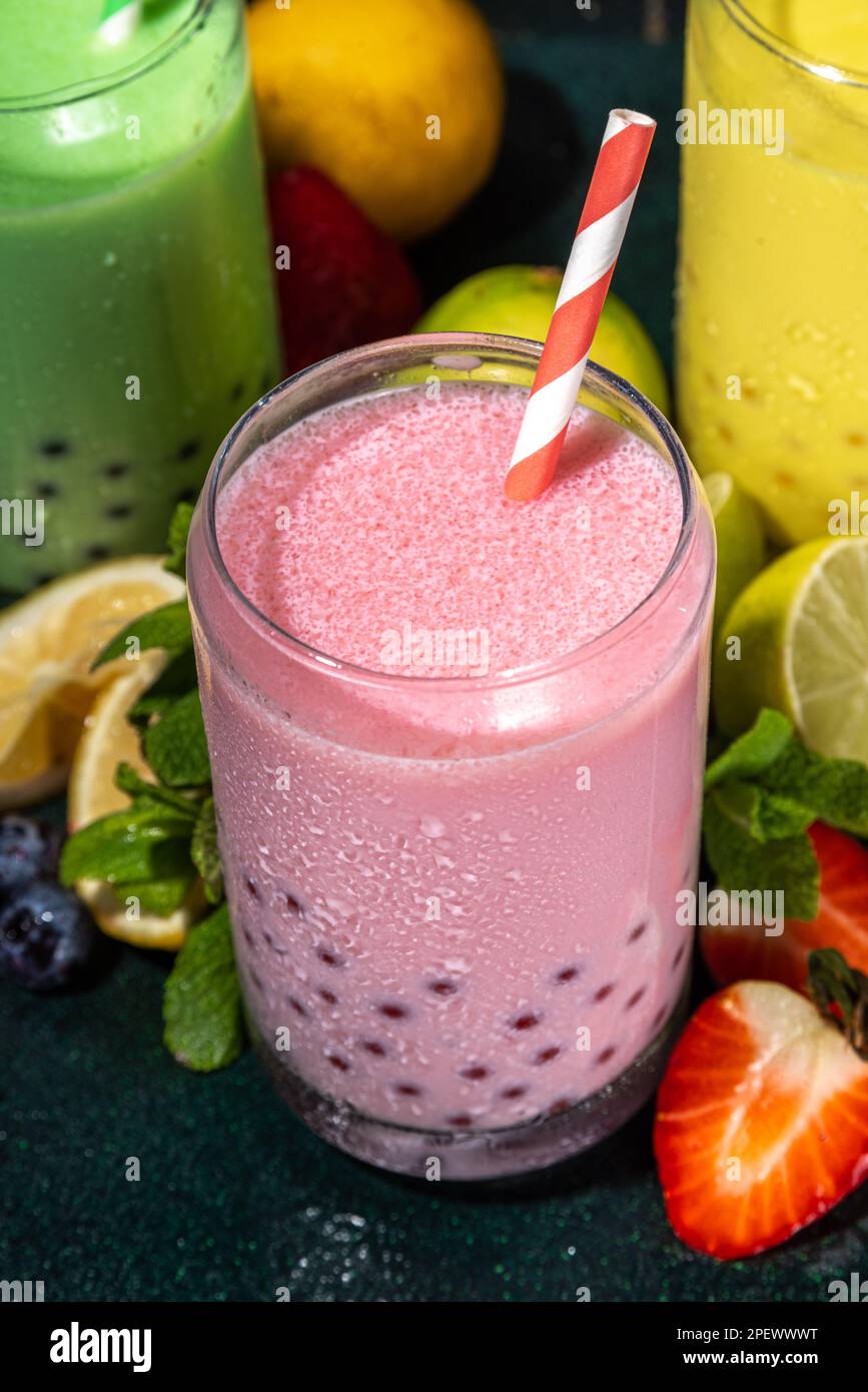 Set of three colorful summer bubble tea, bright creamy pearl tea or ...