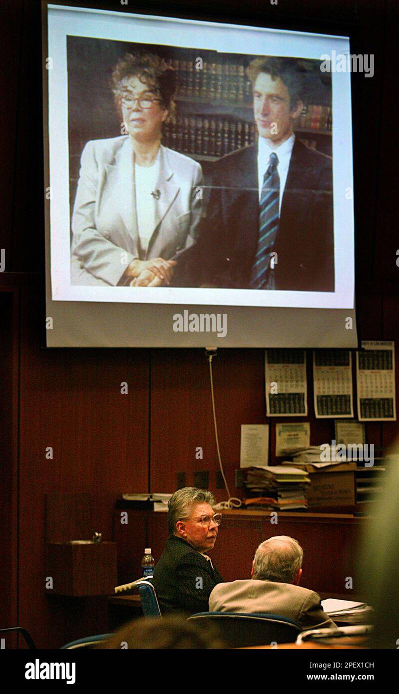 A photo of Sante Kimes and her son is shown above Kimes by the