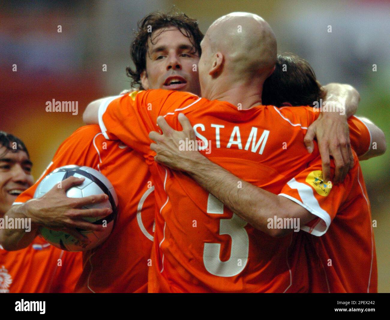 Dutch striker Ruud Van Nistelrooy, left, celebrates with teammate
