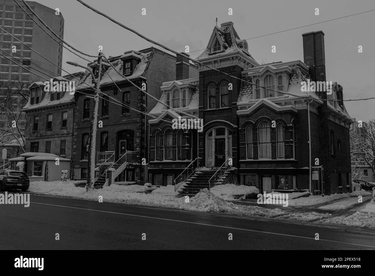 Transition of architectural styles of the Stoddard House (1828), St. Matthew's Manse (1874), and Renner-Carney House (1891) buildings on Barrington St Stock Photo