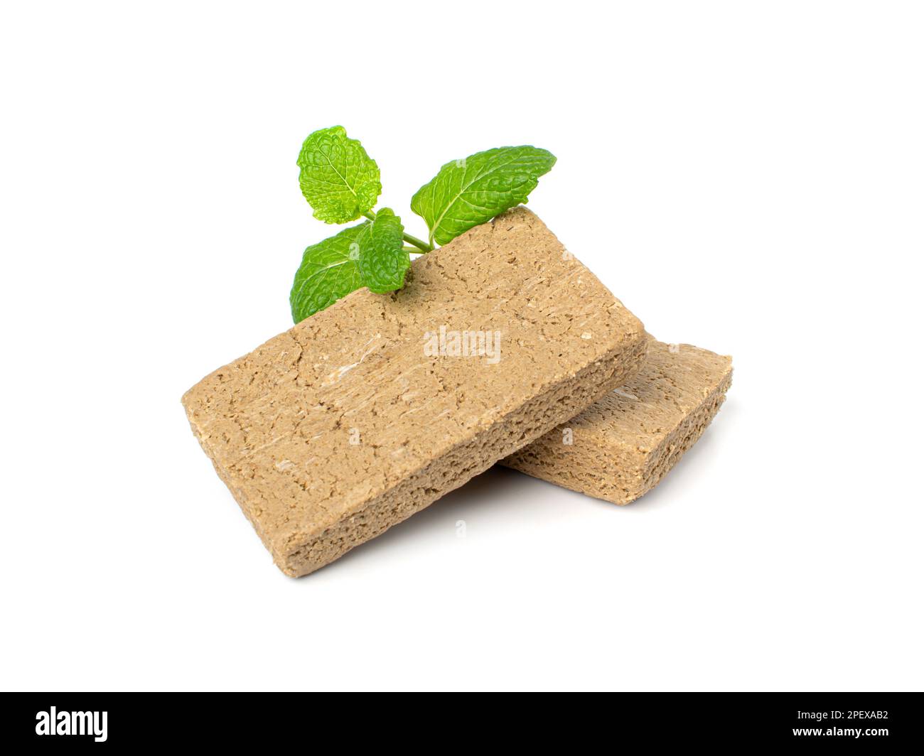 Halva Pieces Pile Isolated, Sunflower Halawa, Halvah or Halwa with Sunflower Seeds on White Background Stock Photo