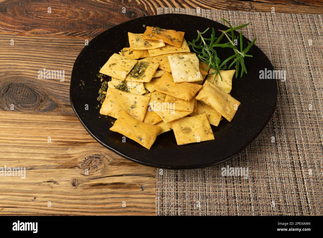Pita Chips Pile on Black Plate, Small Wheat Tortillas, Crunchy Flat
