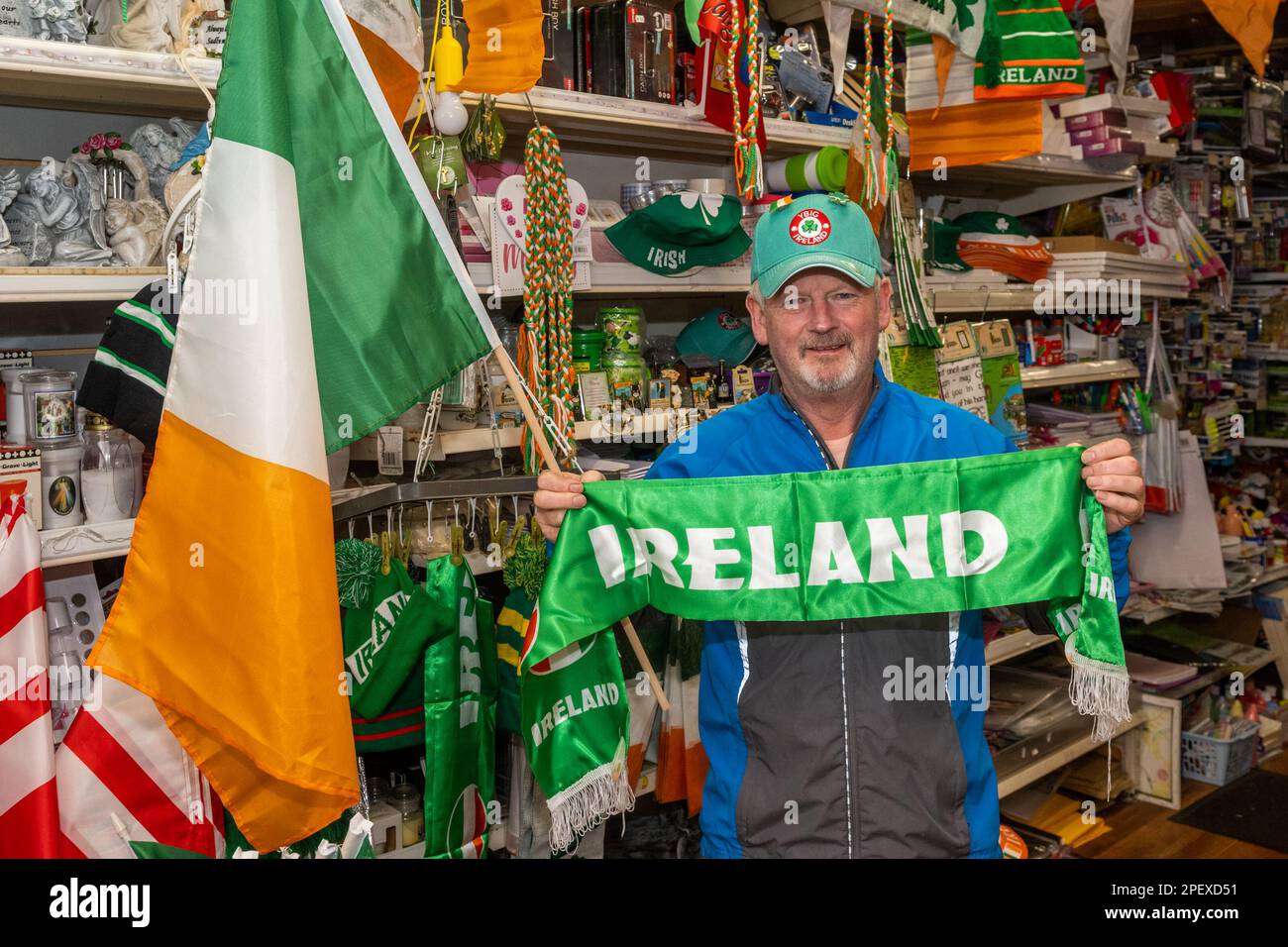 Clonakilty, West Cork, Ireland. 16th Mar, 2023. Preparations are well under way for St. Patrick's Day in the West Cork town of Clonakilty. Dan O'Donovan of 'Dan's Deals 4 You' in his shop with St. Patrick's Day themed products. Credit: AG News/Alamy Live News Stock Photo