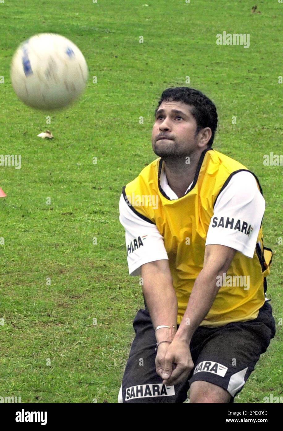 Indian cricketer Sachin Tendulkar plays volleyball at the National