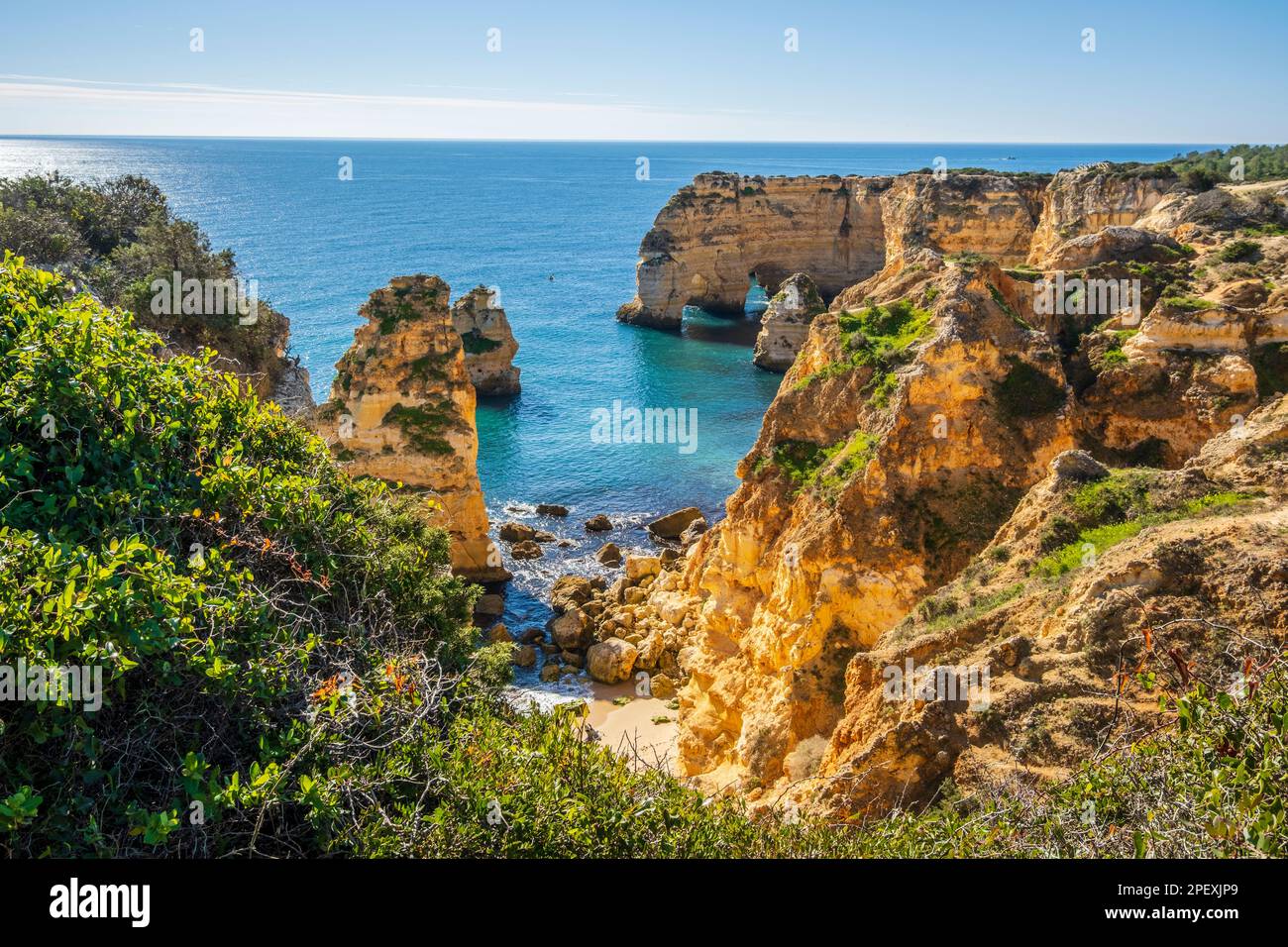 Beautiful cliffs and rock formations by the Atlantic Ocean at Marinha ...