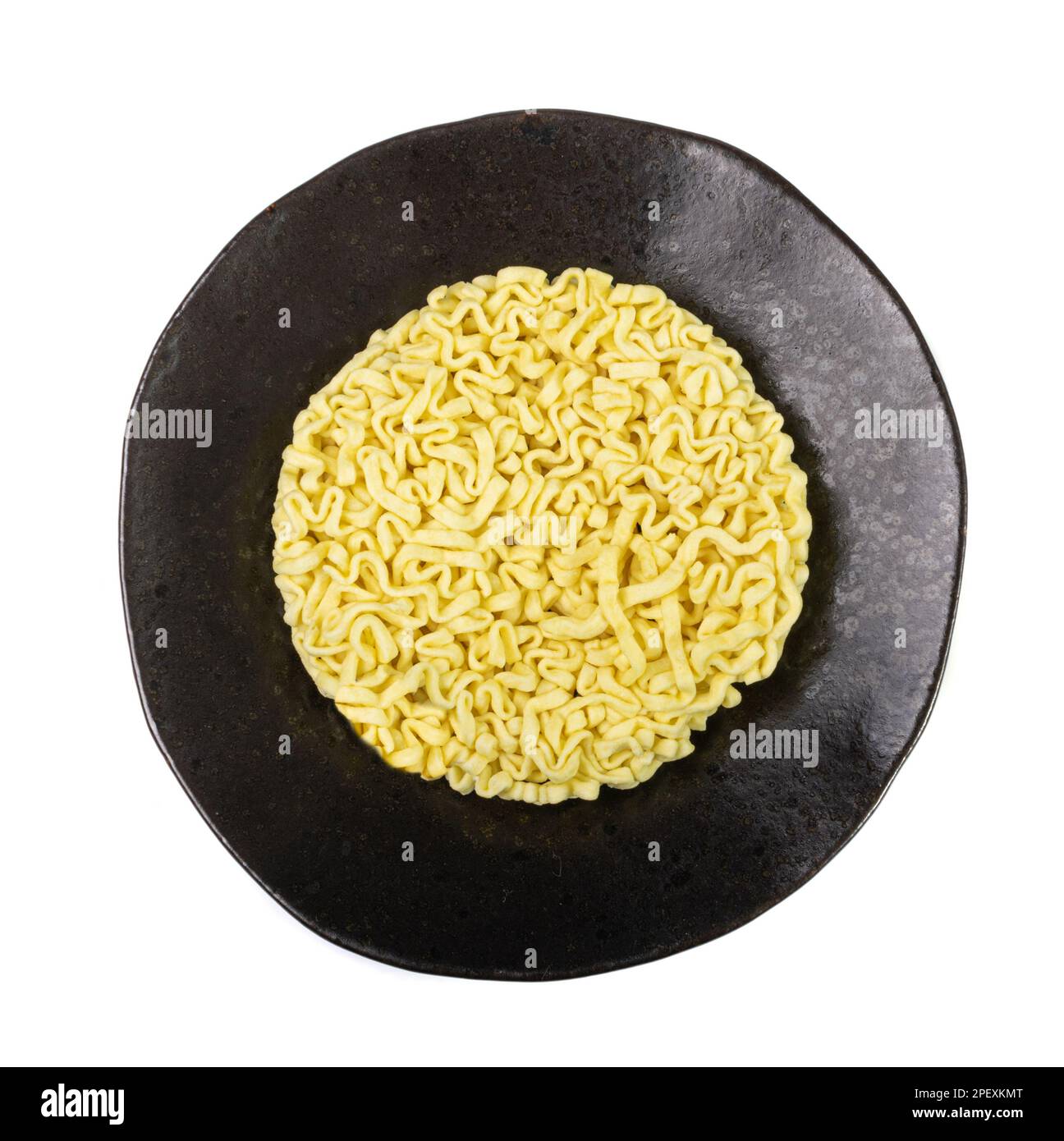 Dry Instant Noodles Isolated, Round Asian Pasta on Black Plate