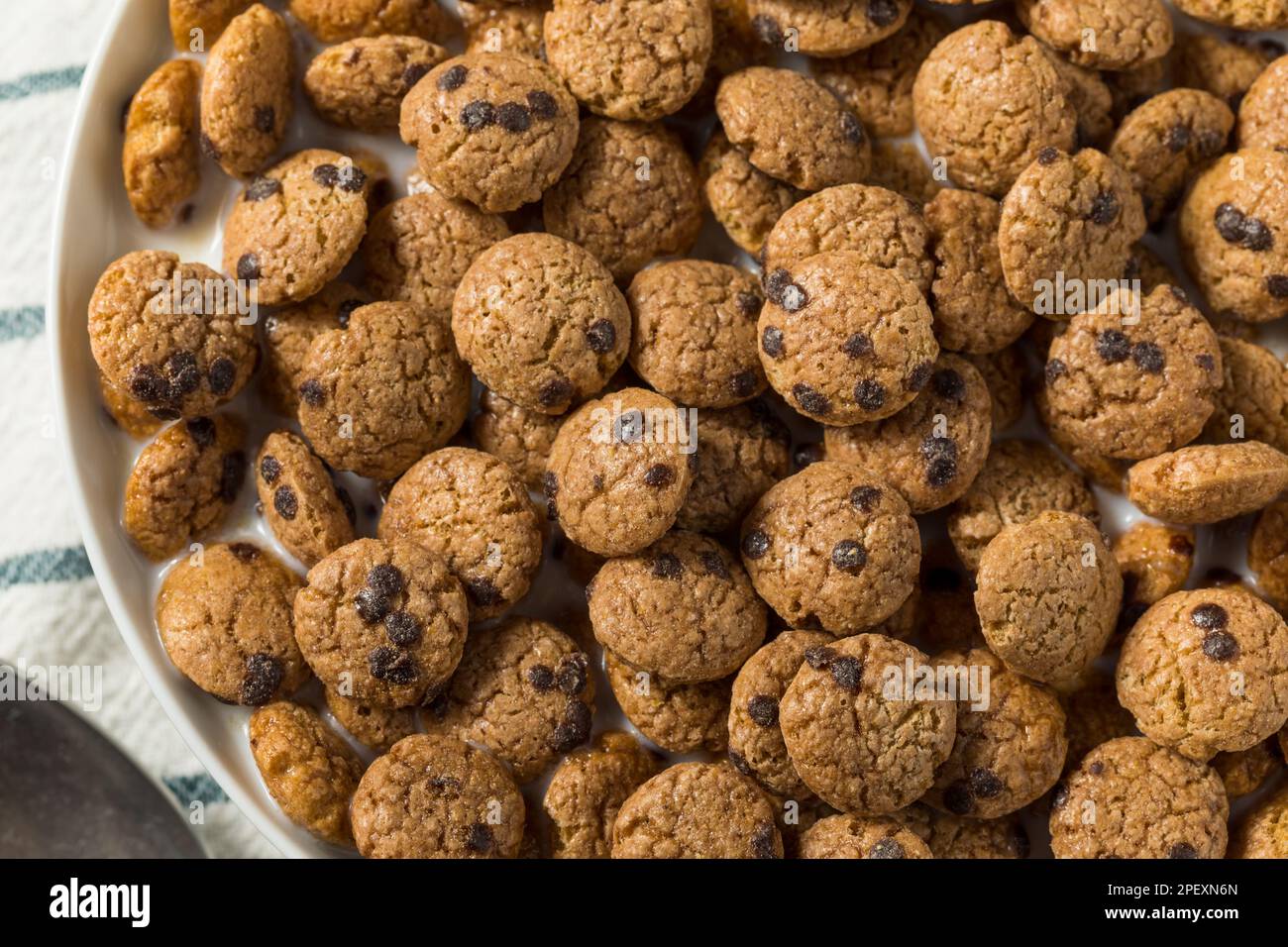 Crispy Chocolate Chip Cookie Breakfast Cereal with Milk Stock Photo Alamy