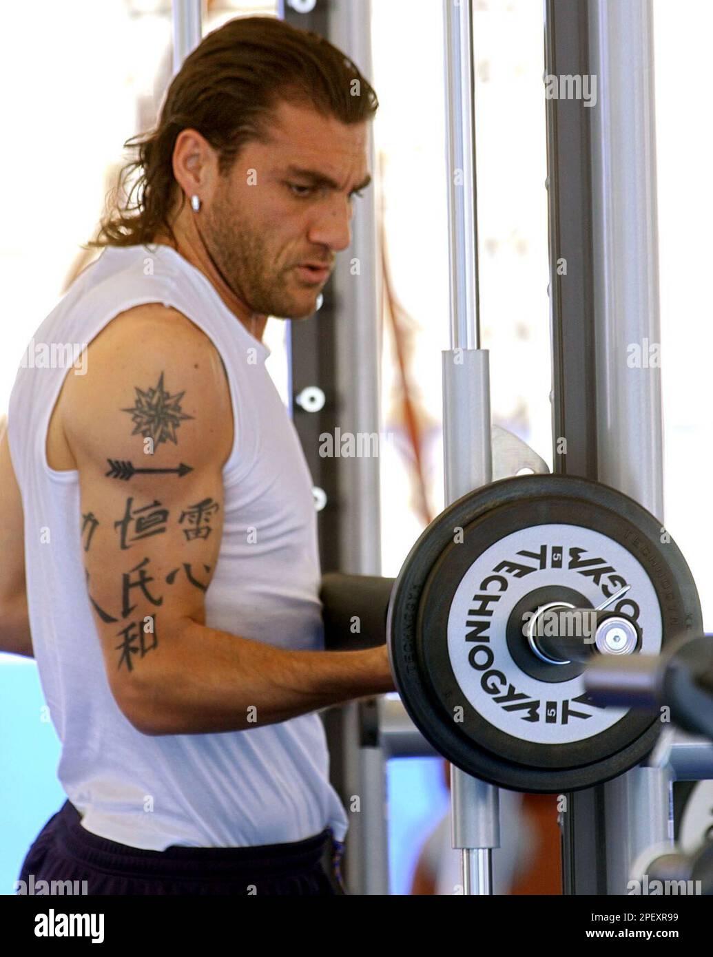 Italy's Christian Vieri sports a Chinese characters tattoo during a  training session with his team in Lisbon's Restelo stadium, Thursday, June  10, 2004. Italy is in Portugal to participate in the Euro