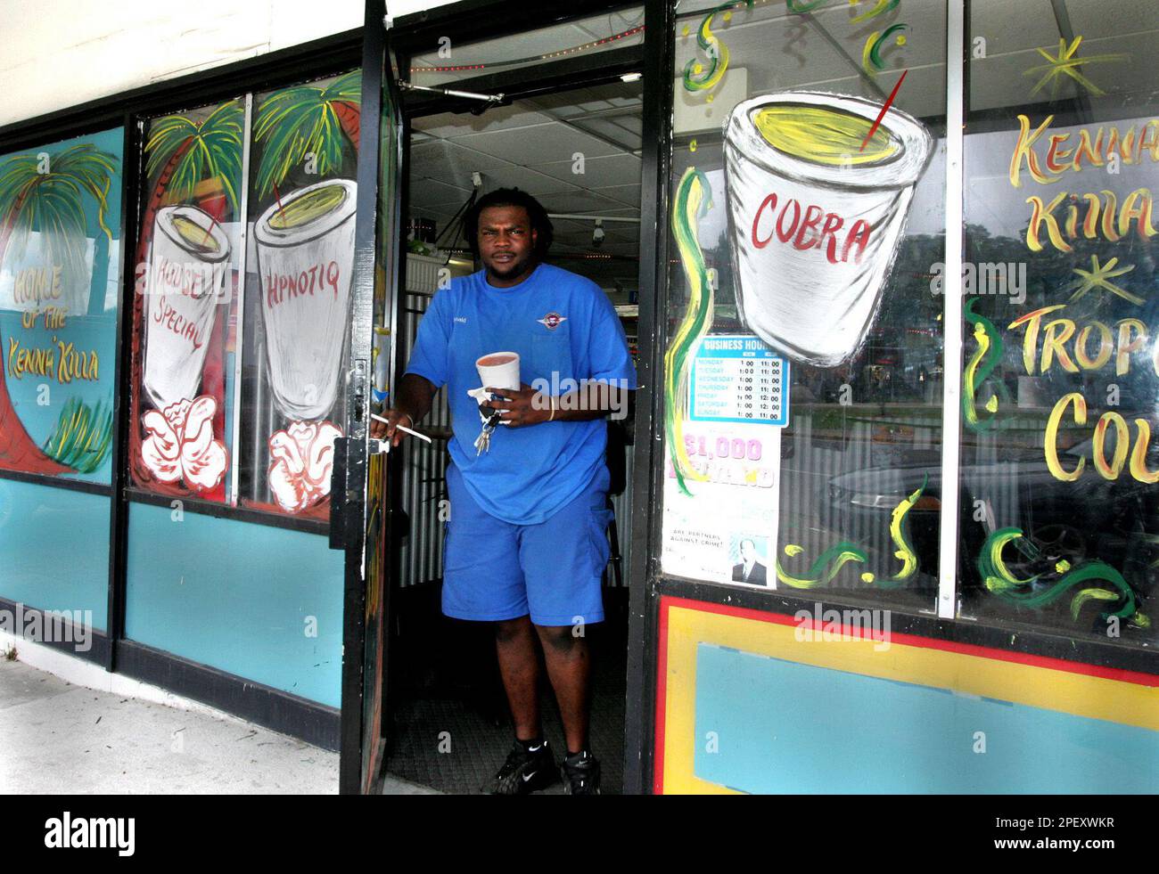 ** ADVANCE FOR WEEKEND EDITIONS JUNE 1214 ** Ronald Arso from New Orleans has a Daiquiri to go