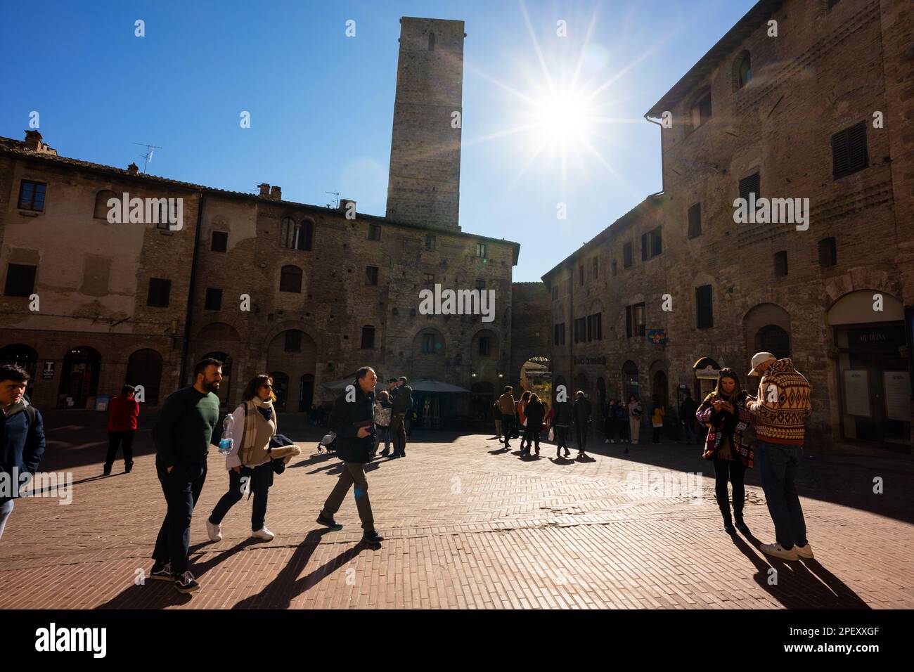 The medieval walled hill town of San Gimignano, a popularedestination for tourists in Tuscany, Italy. A UNESCO world heritage site. Stock Photo