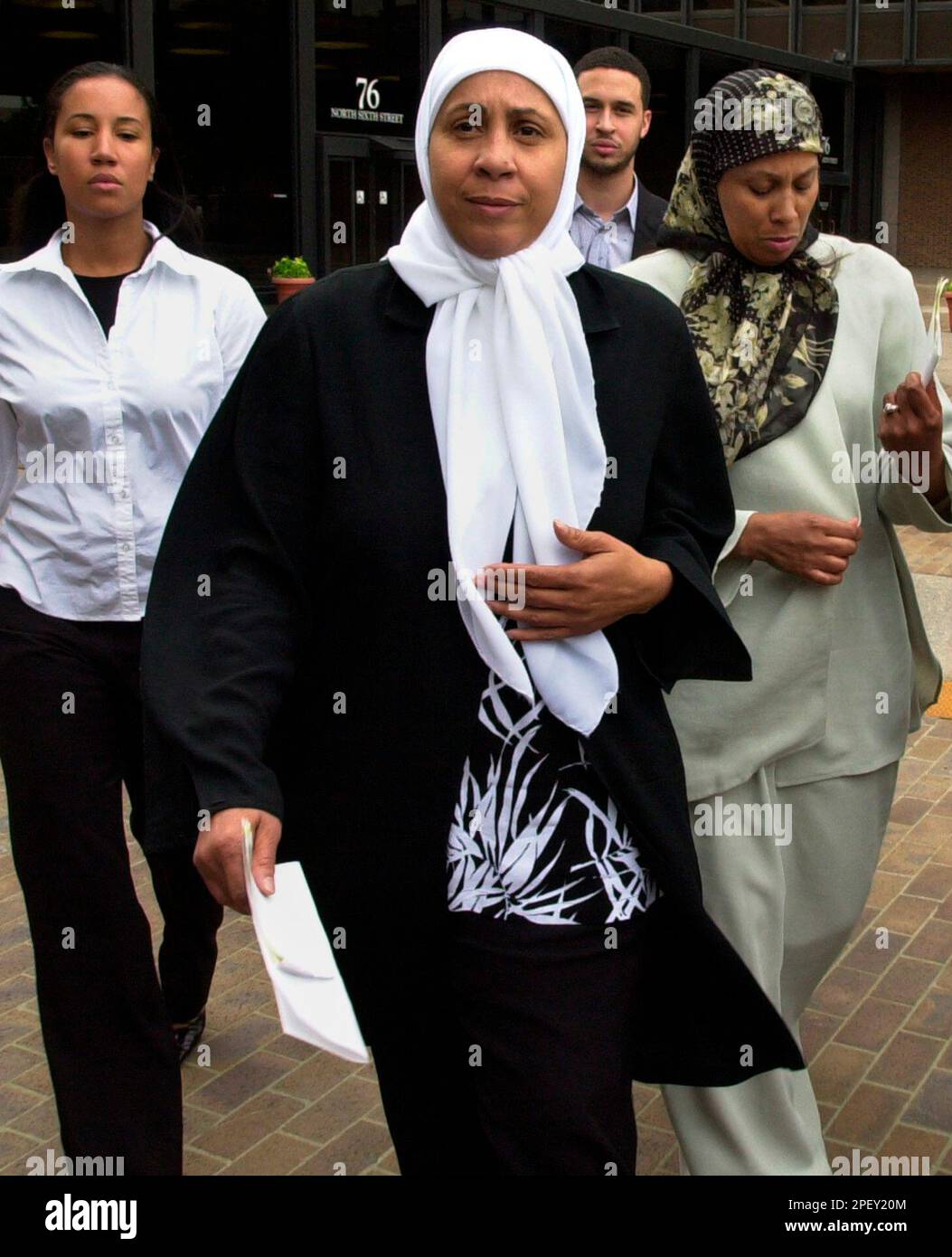 Faridah Ali, center, leaves the U.S. Courthouse with Zaynah Rasool