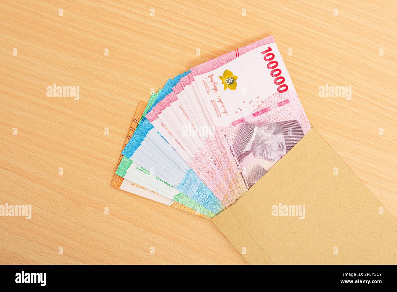 One hundred thousand rupiah money (Rp. 100.000 Seratus Ribu Rupiah), Indonesian currency financial money management concept. Stock Photo