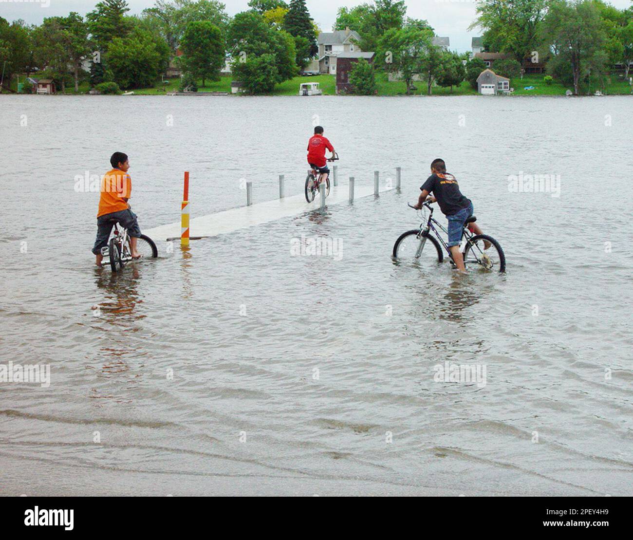 Ricky Rocha, 13, from left, Michael Rodriguez, 12, and Daniel ...
