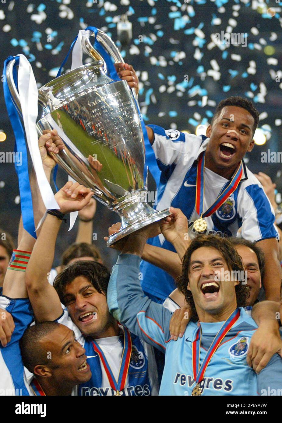 Porto players celebrate as they lift the trophy after beating